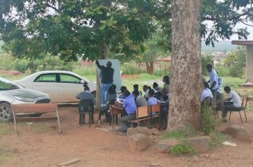 Learners from the Muvhavha Secondary School in Tswinga village, Limpopo, are forced to study under trees.