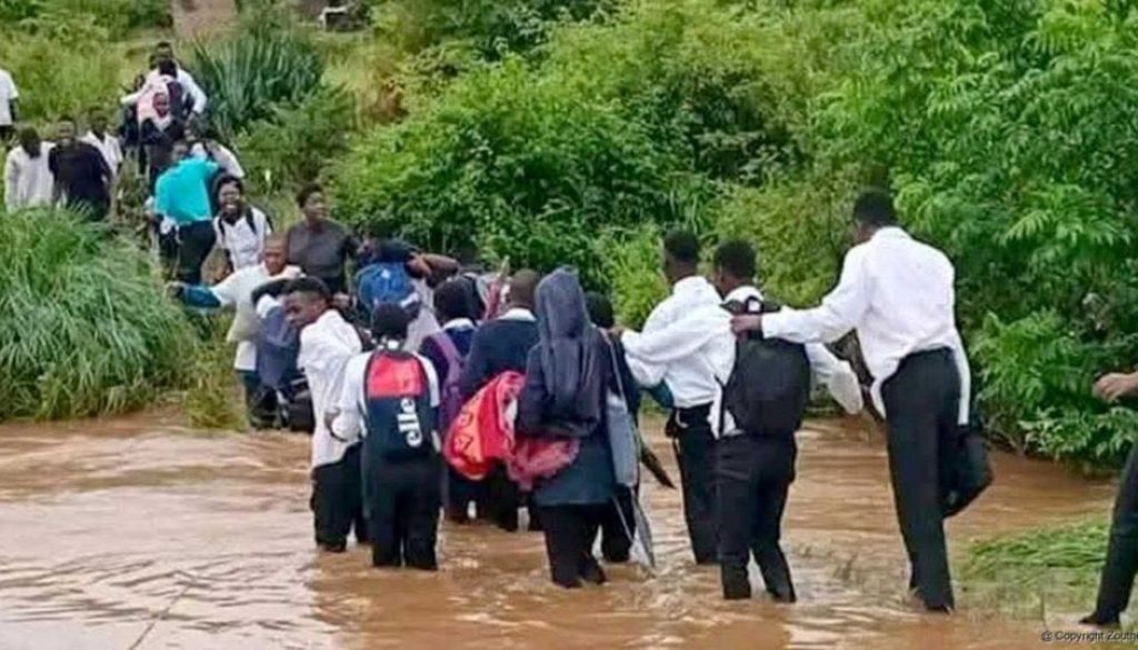 School children crossing the river in Limpopo