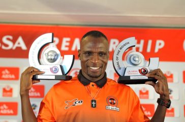 Former Polokwane City and Mamelodi Sundowns striker Rodney Ramagalela holding Absa Premiership goal of the moth and player of the month trophies.